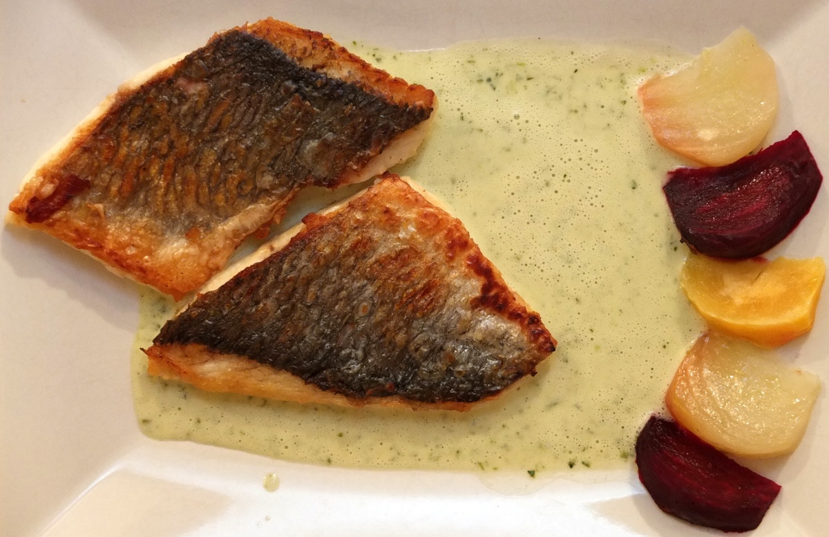 'Fillet of bream, lightly cooked with a crusty skin, green sauce